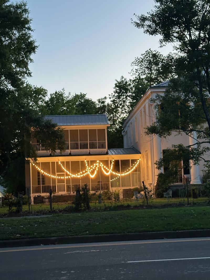 Bistro, String & Event Lighting project — Screened porch with string-light swags