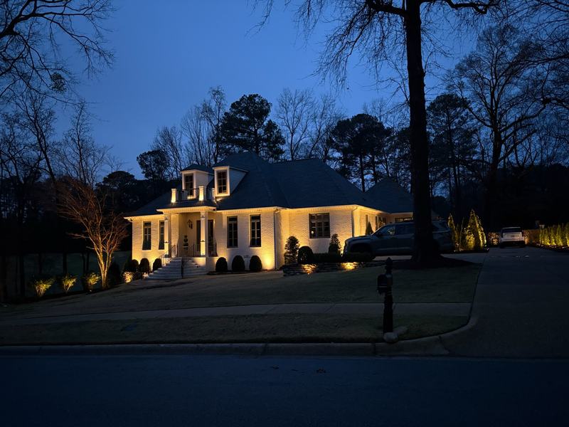 Architectural & Front-of-House Uplighting project — Dormered white house + landscaping, blue hour